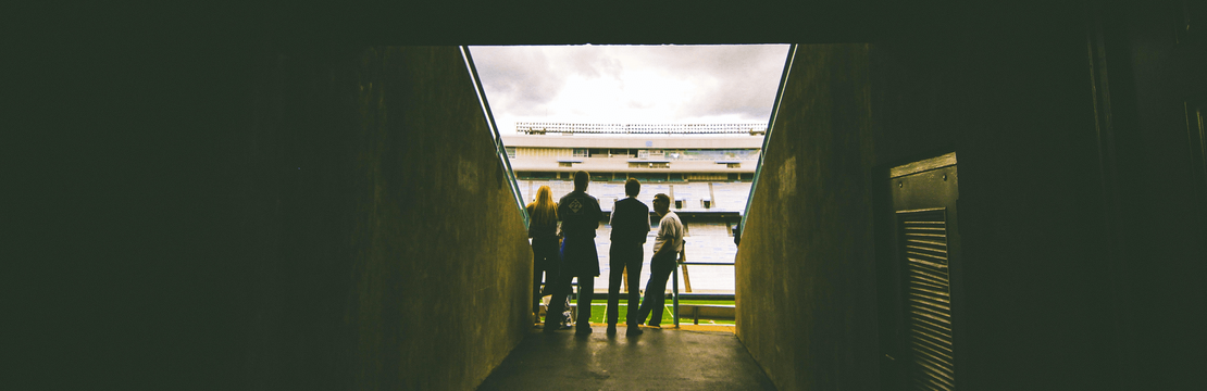 Sport managers at the end of a Players tunnel leading to the pitch